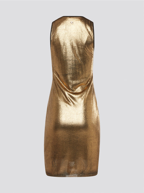 Step into the wild side with the Gold Reptilian Bodycon Dress from Roberto Cavalli. This eye-catching silhouette is adorned with a luxurious reptile print that will turn heads wherever you go. Perfect for a night out on the town, this dress is sure to make you feel like a dazzling diva.