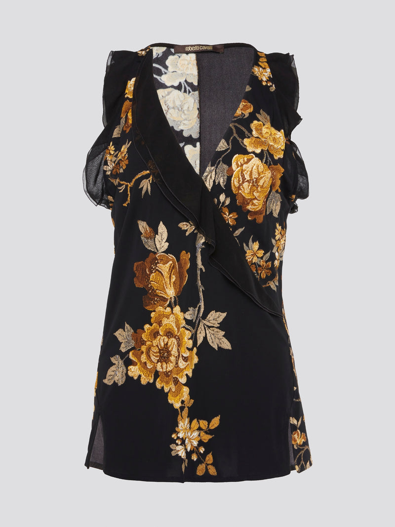 Indulge in the opulence of the Black Foliage Wrap Dress by Roberto Cavalli, a stunning blend of elegance and edge. The striking foliage pattern and flattering wrap silhouette create a sophisticated look that is perfect for any special occasion. Channel your inner fashionista and turn heads wherever you go in this statement-making piece.