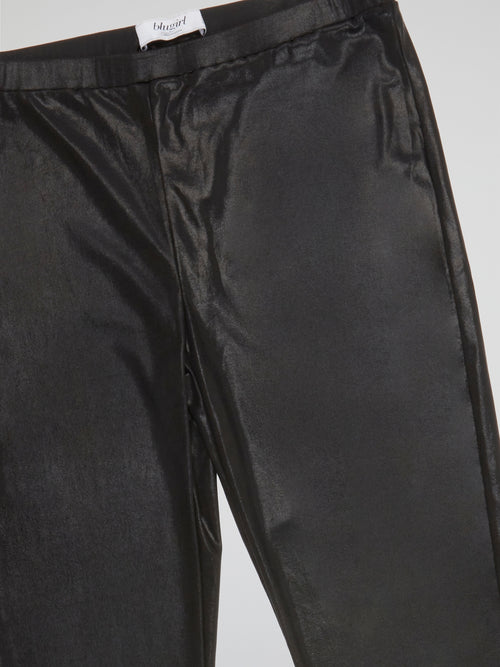 Step into style with Blugirl's black leather pants, perfect for those who want to make a bold fashion statement. Made with high-quality materials, these pants offer a sleek and edgy look that will turn heads wherever you go. Whether you dress them up with heels or keep it casual with sneakers, these leather pants are a versatile wardrobe staple.