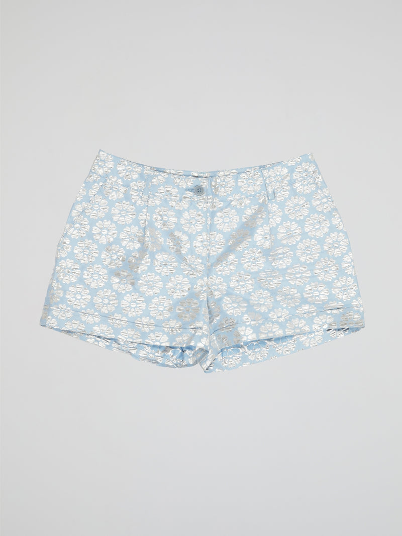 Transport yourself to a whimsical garden with these Blue Floral Print Shorts by Parosh. Made from luxurious fabric, these shorts feature a vibrant blue hue adorned with intricate floral designs for a statement-making look. Perfect for exploring the city or lounging in the sun, these shorts are a must-have addition to your wardrobe.